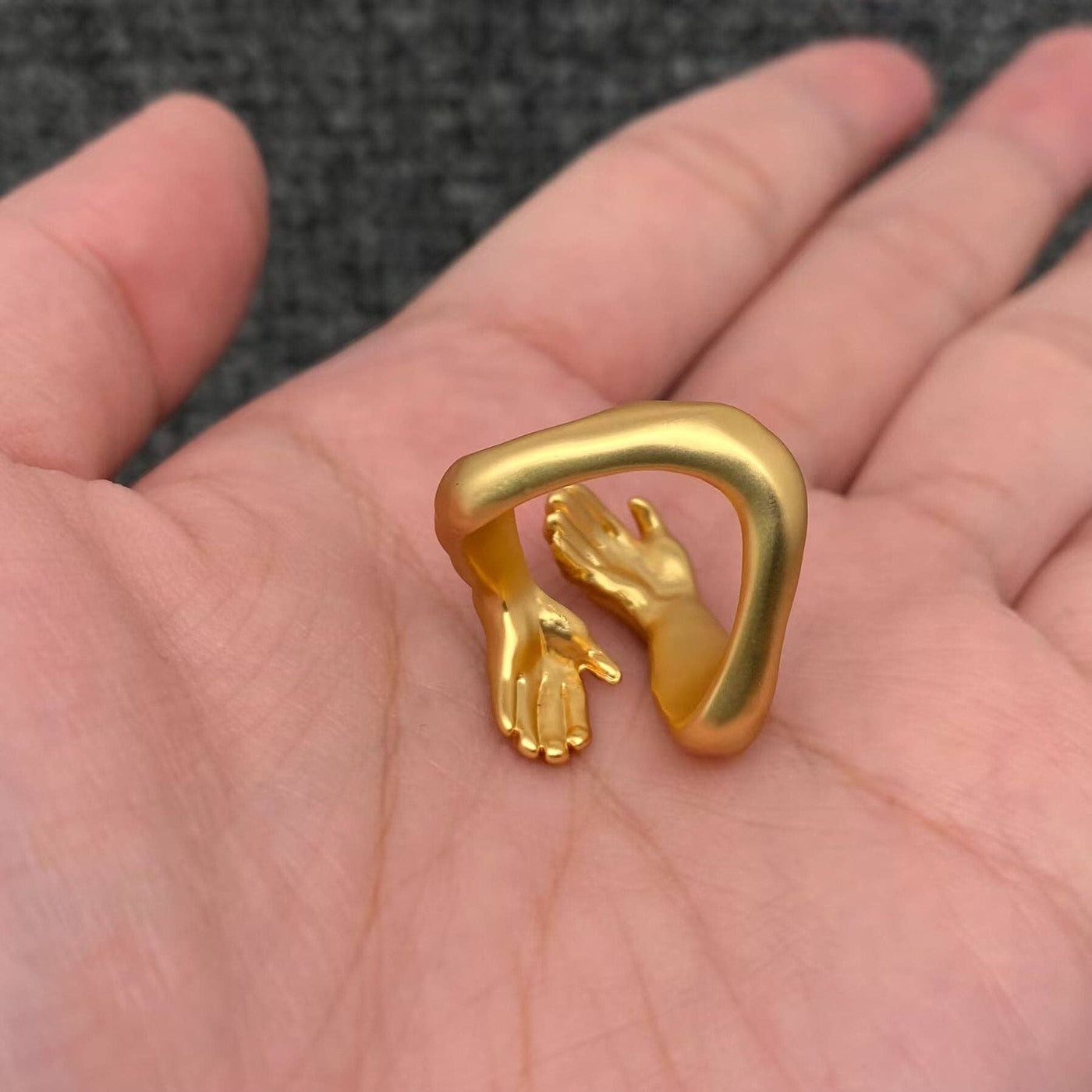 Embraced Hands Adjustable Ring